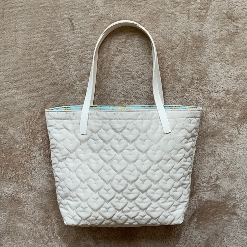 A Charming and Elegant and Cream Small Tote Bag